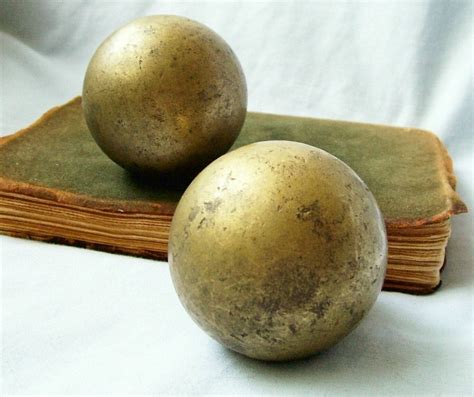 antique metal balls